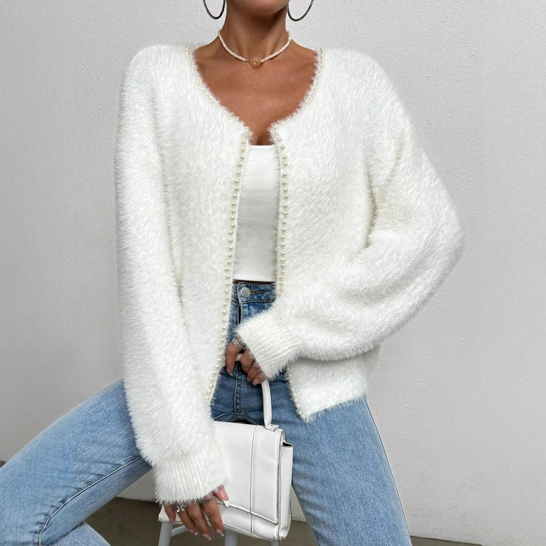 White women's cardigan with V-neck and beaded knit detail