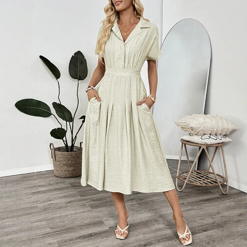 Light green women's twill shirt dress with lapel collar, adjustable waist belt, and splicing detail