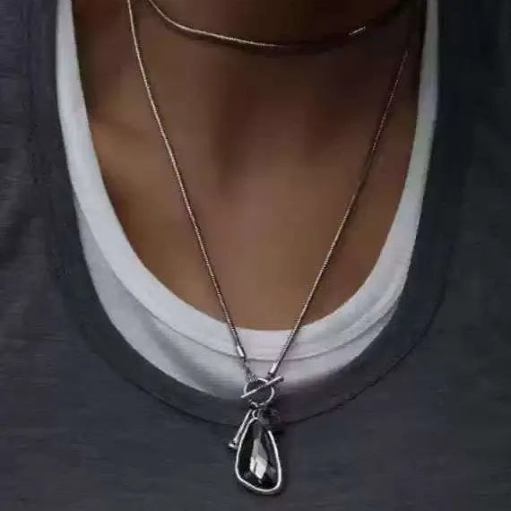 Long geometric plaid alloy pendant on a snake bones chain necklace in blue, champagne, or grey.