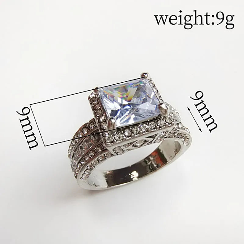 Women's silver geometric engagement ring with electroplated gold or white finish and round design