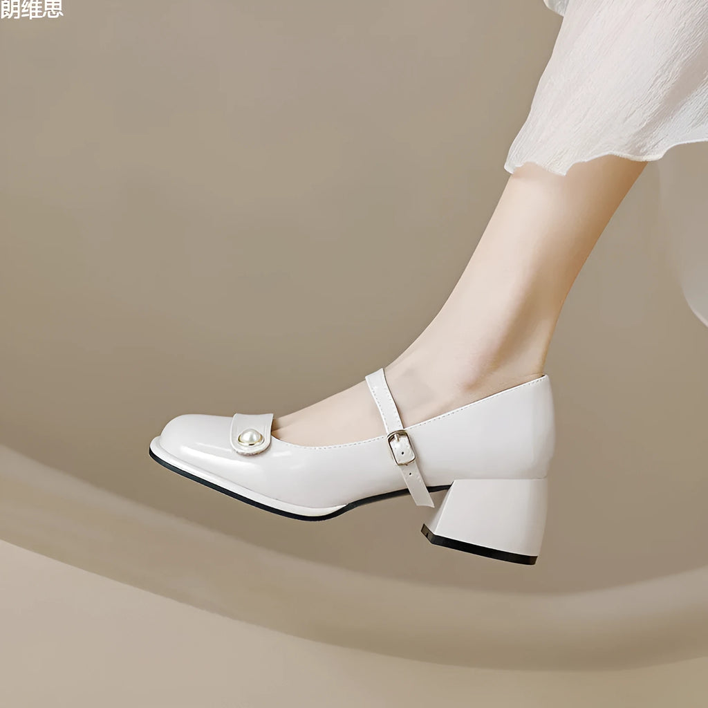 Women's patent leather chunky heel pump in apricot with square toe and buckle closure