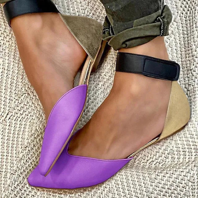 Women's velcro sandals with hollowed straps in four colour options showing flat heel design