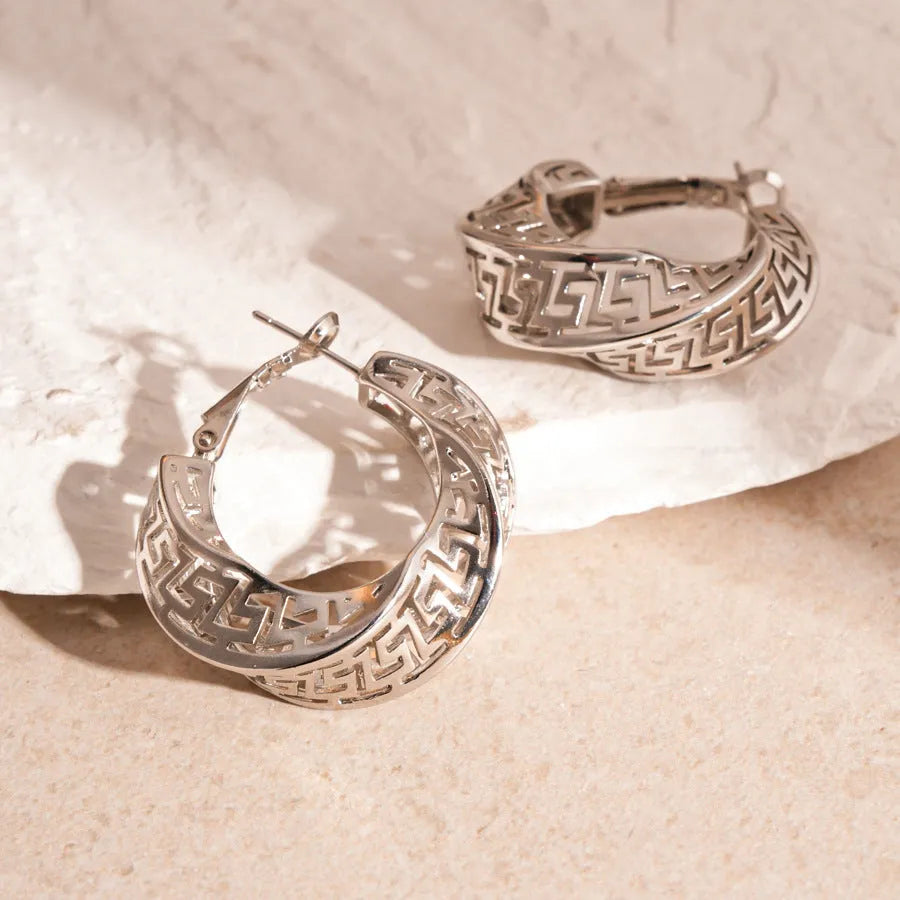 Women's geometric hollow stud earrings with twisted round design in electroplated copper