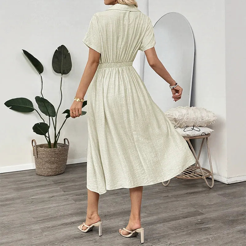 Light green women's twill shirt dress with lapel collar, adjustable waist belt, and splicing detail