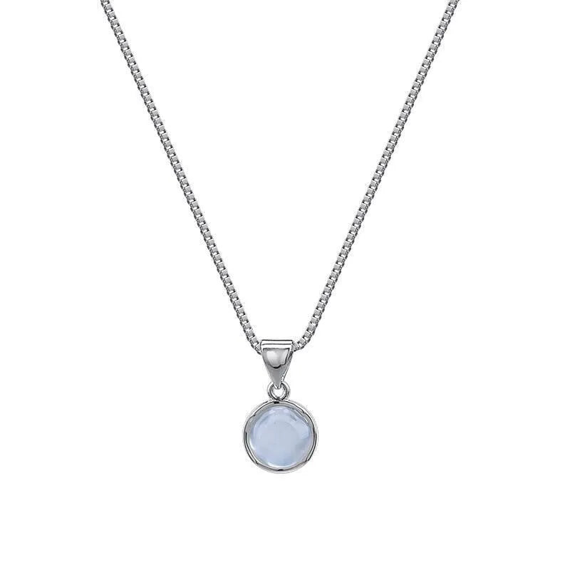 Korean-style oval pendant necklace with an eight-point star on an adjustable silver-toned box chain.