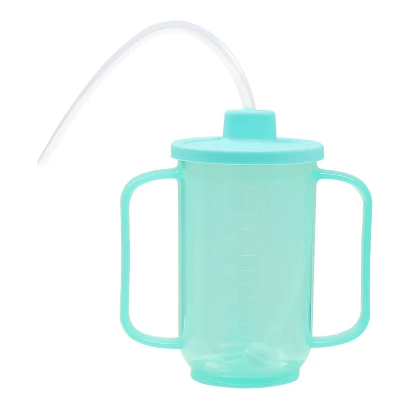 Oblique mouth choke-proof drinking cup with lid and handle, showing optional wrist splint attachment