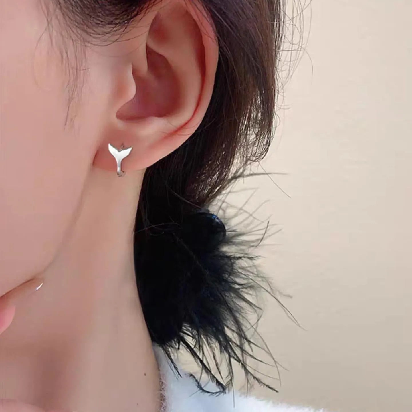 Women's fishtail earrings in copper with electroplated gold finish, simple all-match design