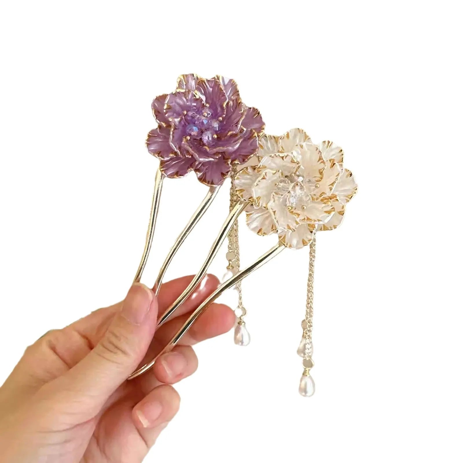 Close-up of a retro U-shaped alloy hairpin with a purple peony flower and tassel design.