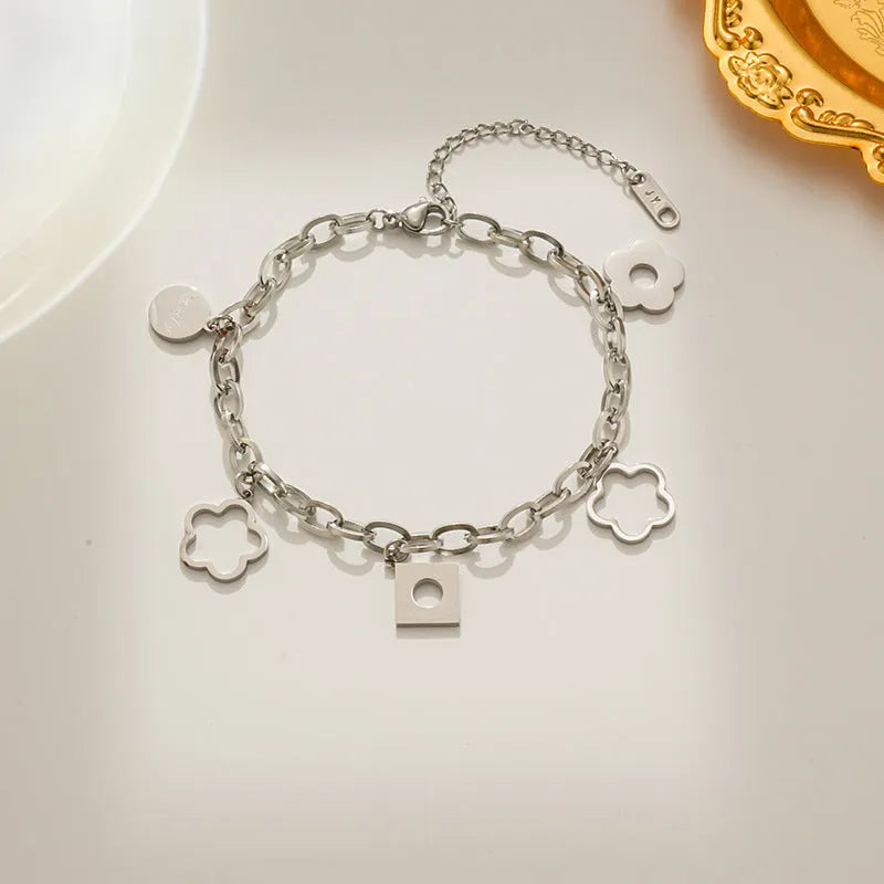 Titanium steel flower pendant bracelet for women, electroplated gold finish, diamond-shaped charm