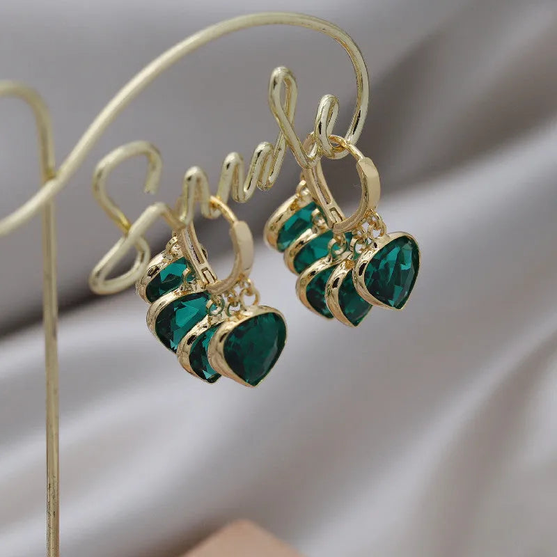 Korean style green heart glass ear clip earrings with dancing pendant design