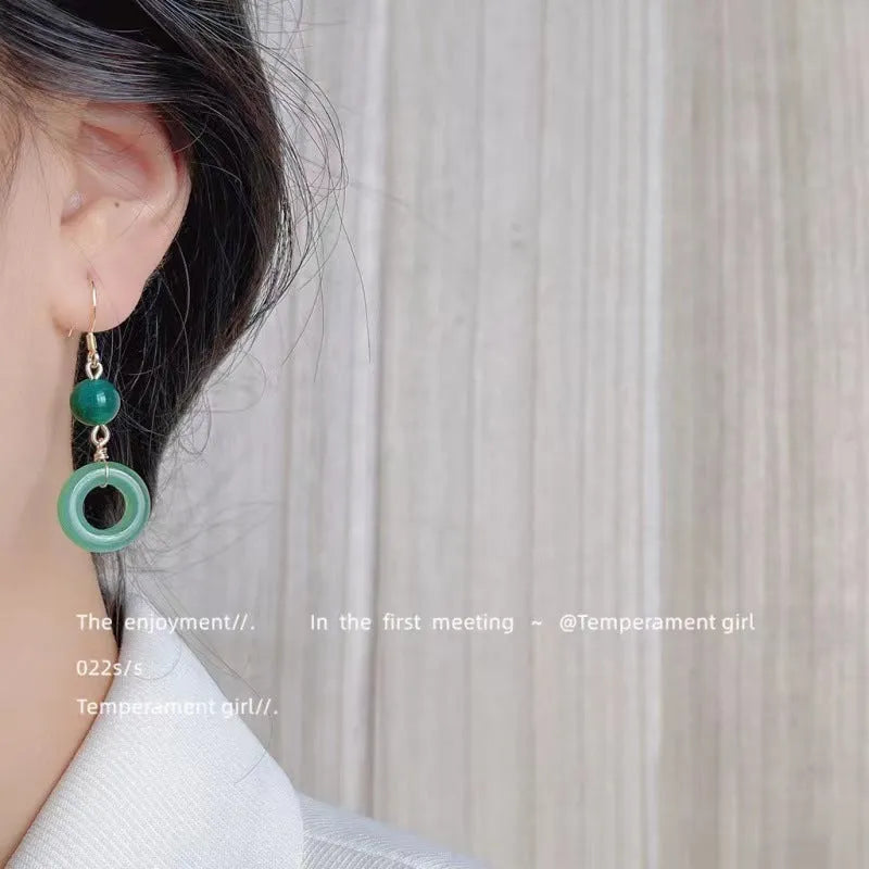 Green zinc alloy peace buckle earrings with geometric shape and ring elements for Chinese fashion