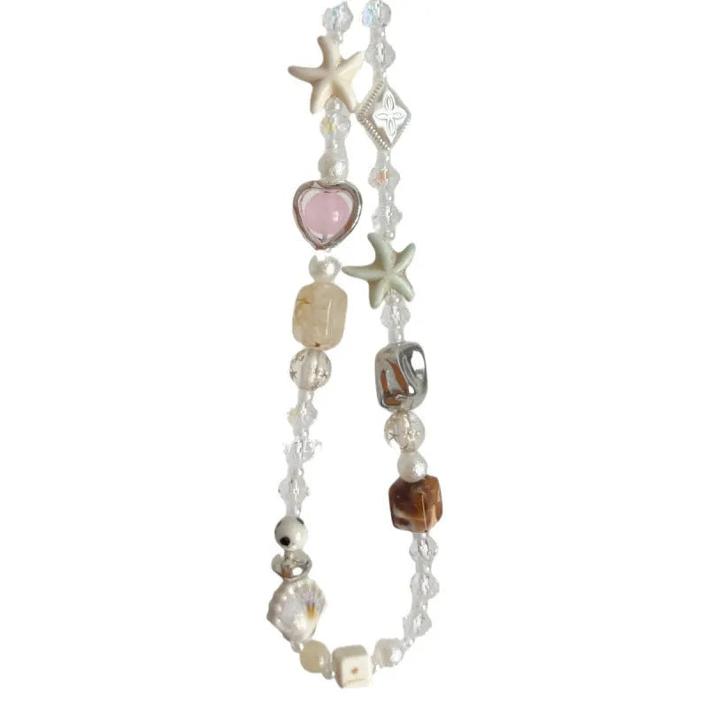 Bohemian sweetheart design alloy mobile phone charm in island sweetheart colour with chain.