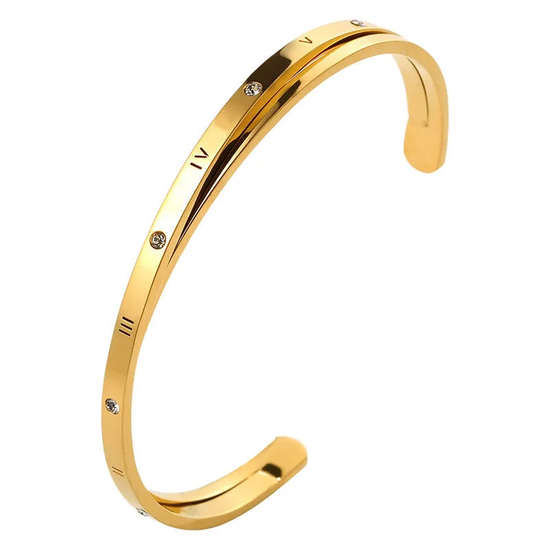 Open-ended stainless steel bracelet with zircon detailing showing rose gold, gold and steel colour options