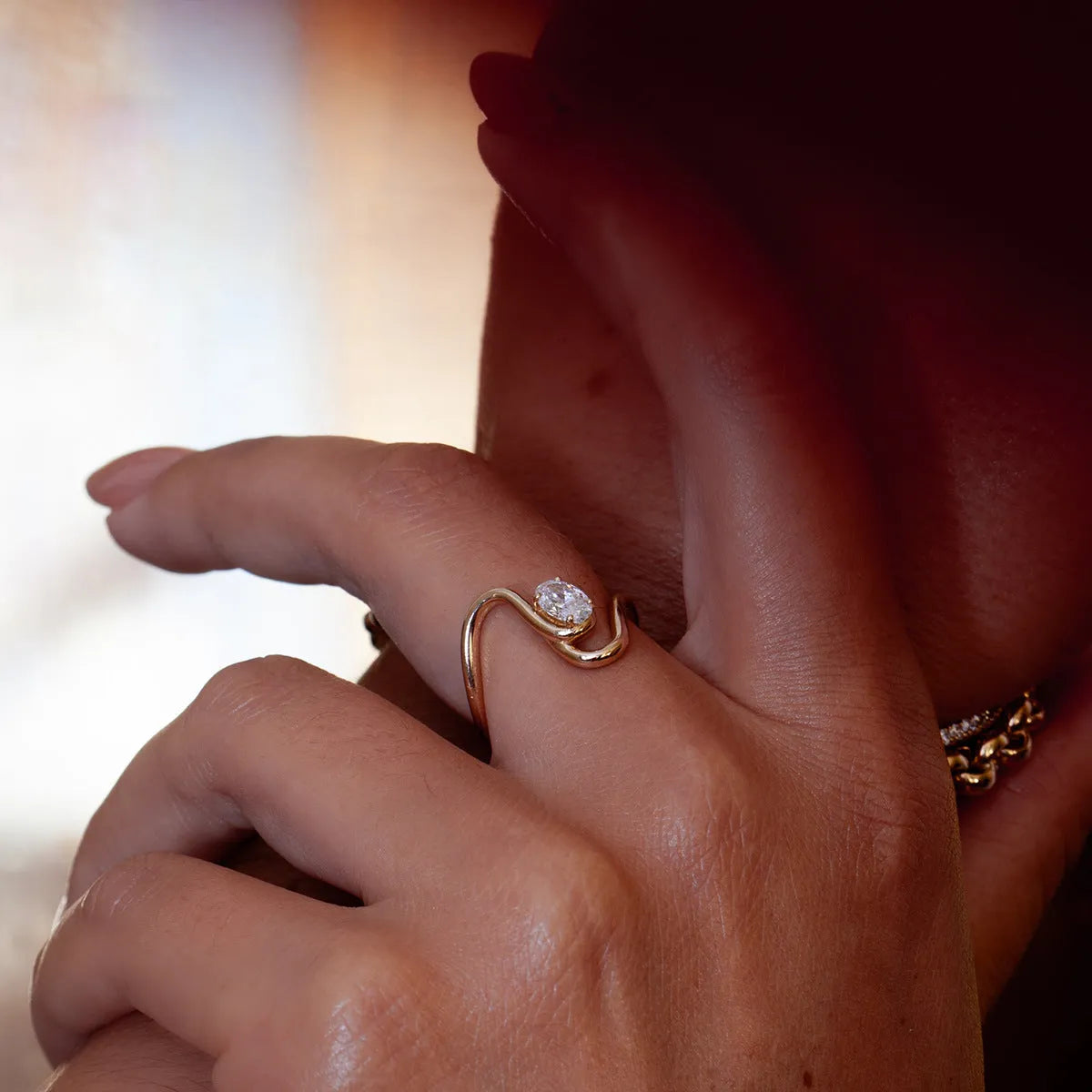 Geometric titanium steel men's zircon ring in a European American style on a grey background.