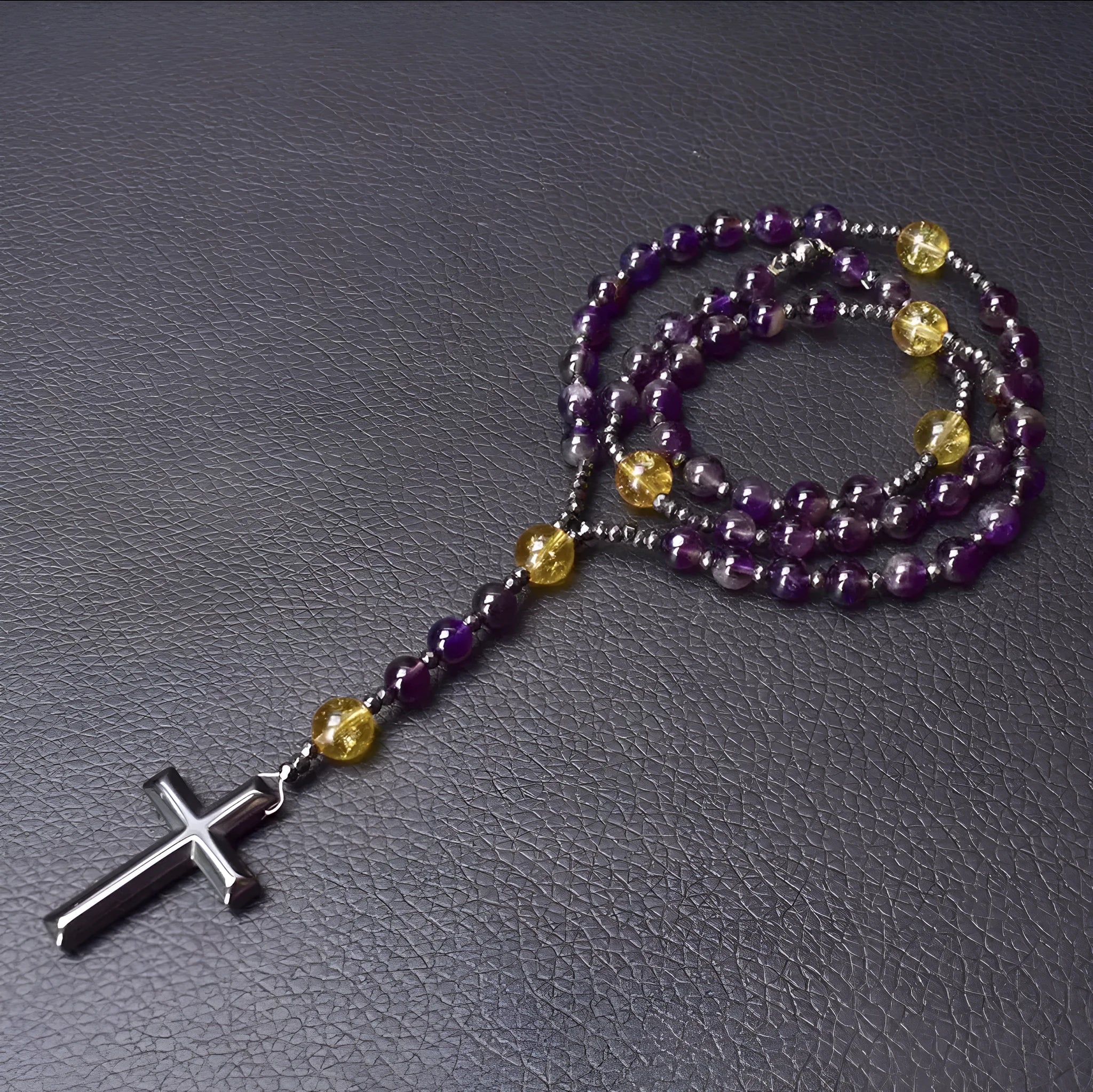 Men's stone cross pendant necklace with hand-woven detail on ball bead chain