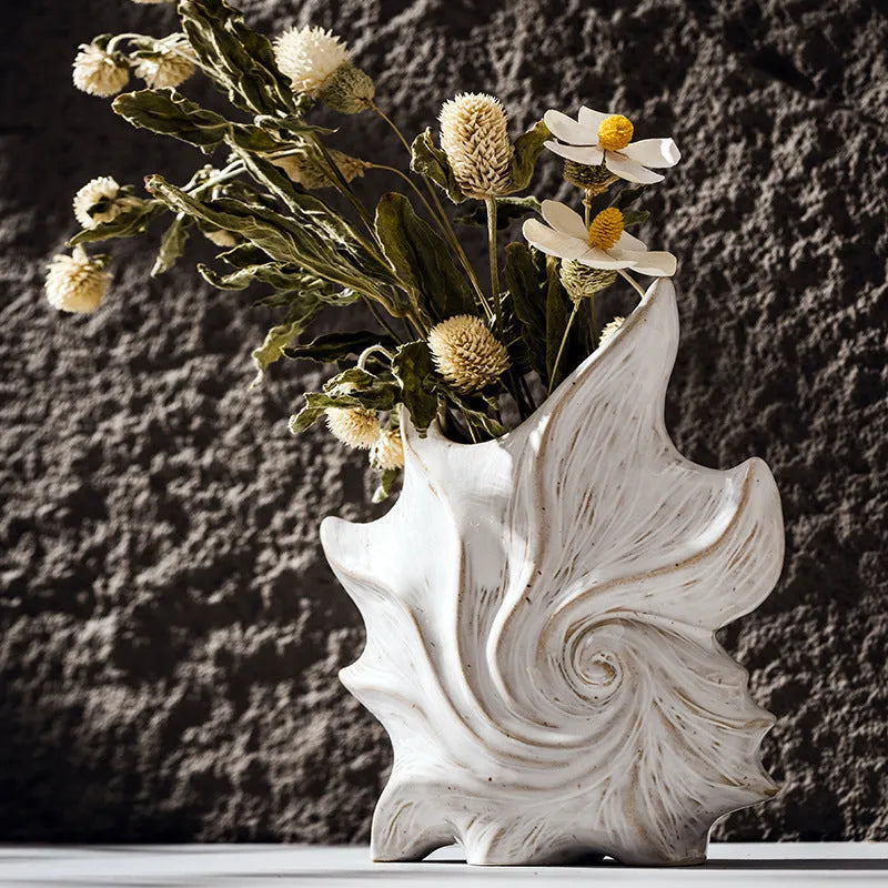 Hexagonal French ceramic vase with coloured glaze in a retro European style.