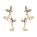 Women's copper butterfly drop earrings with four-butterfly design and gold-coloured finish