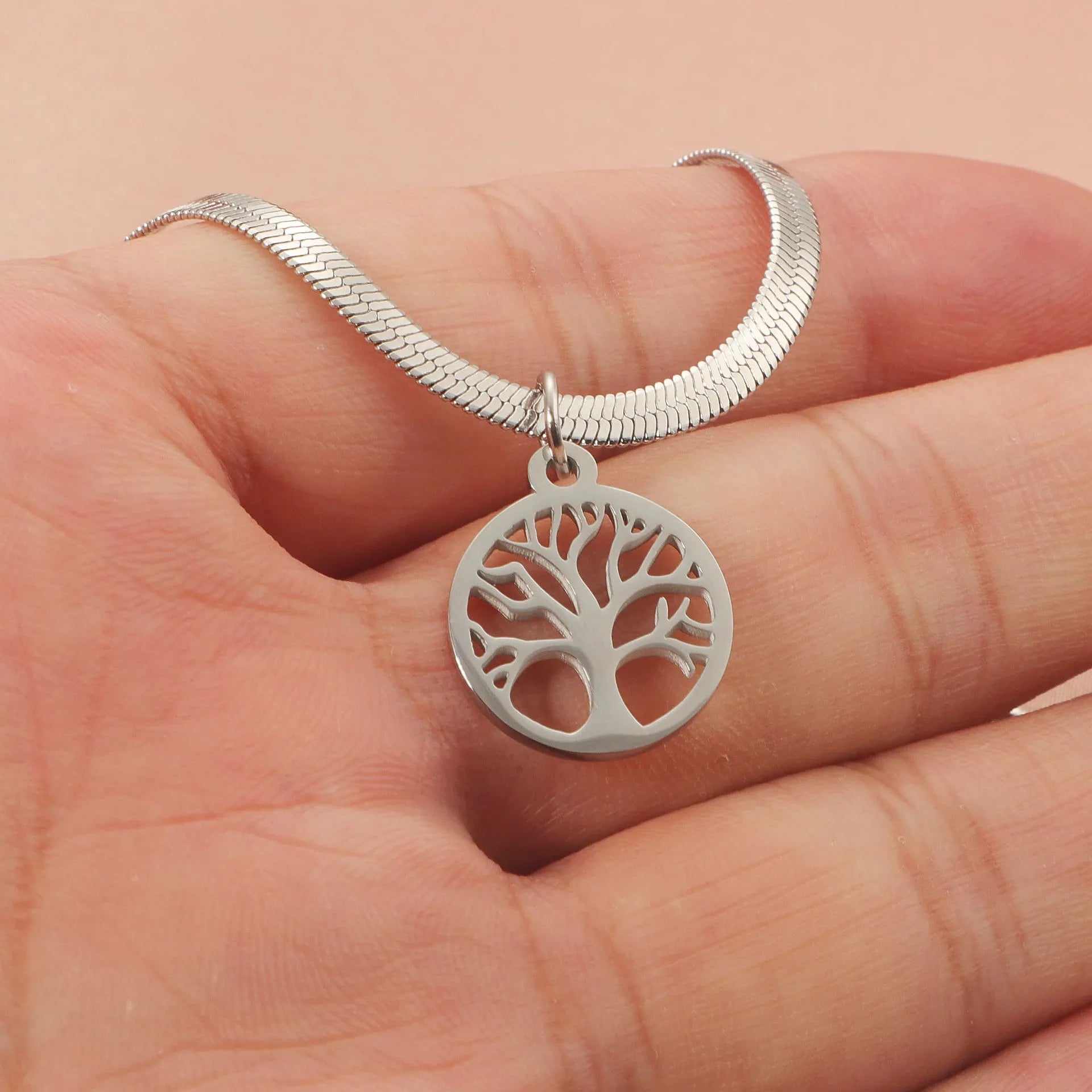 Stainless steel necklace with a U-shaped titanium steel tree pendant on a snake bones chain.