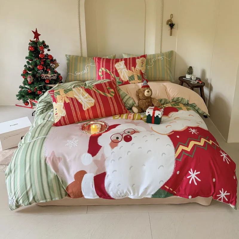 Christmas cartoon print bedding four-piece set on a bed, showing duvet cover and pillowcases.