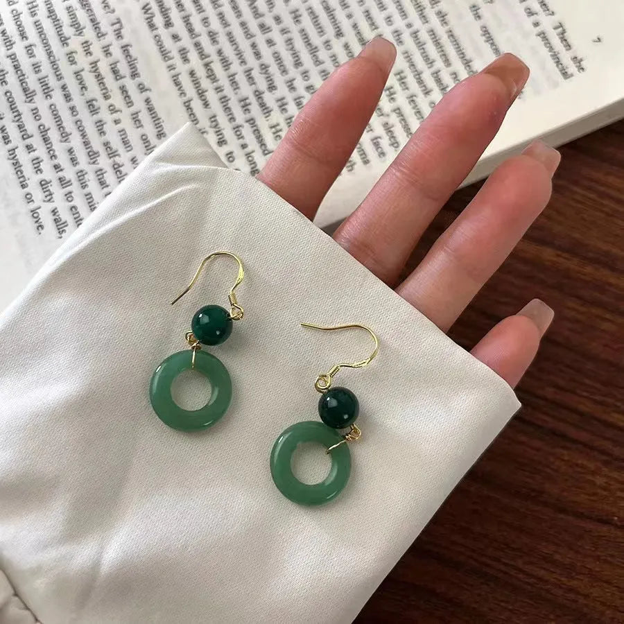 Green zinc alloy peace buckle earrings with geometric shape and ring elements for Chinese fashion