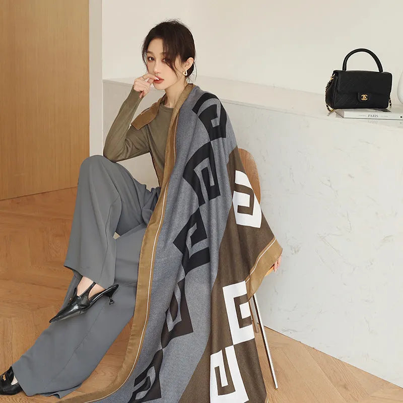 Polyester vintage print scarf draped to show 90x180cm dimensions and decorative pattern