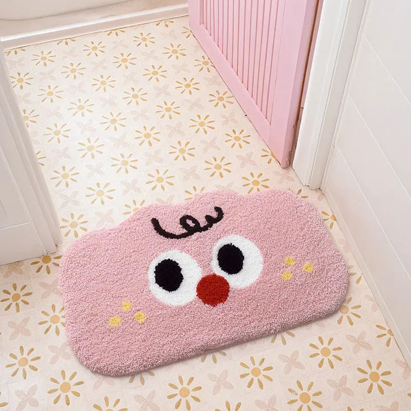 Cartoon anime character printed bathroom mat in green, blue, pink, black, or white, available in three sizes.