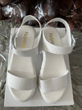 Beige women's platform sandals with ankle-strap buckle and peep toe fish mouth design.