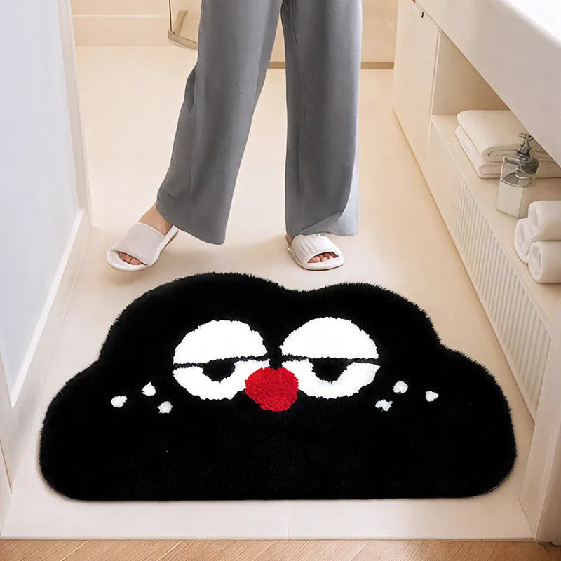 Cartoon anime character printed bathroom mat in green, blue, pink, black, or white, available in three sizes.