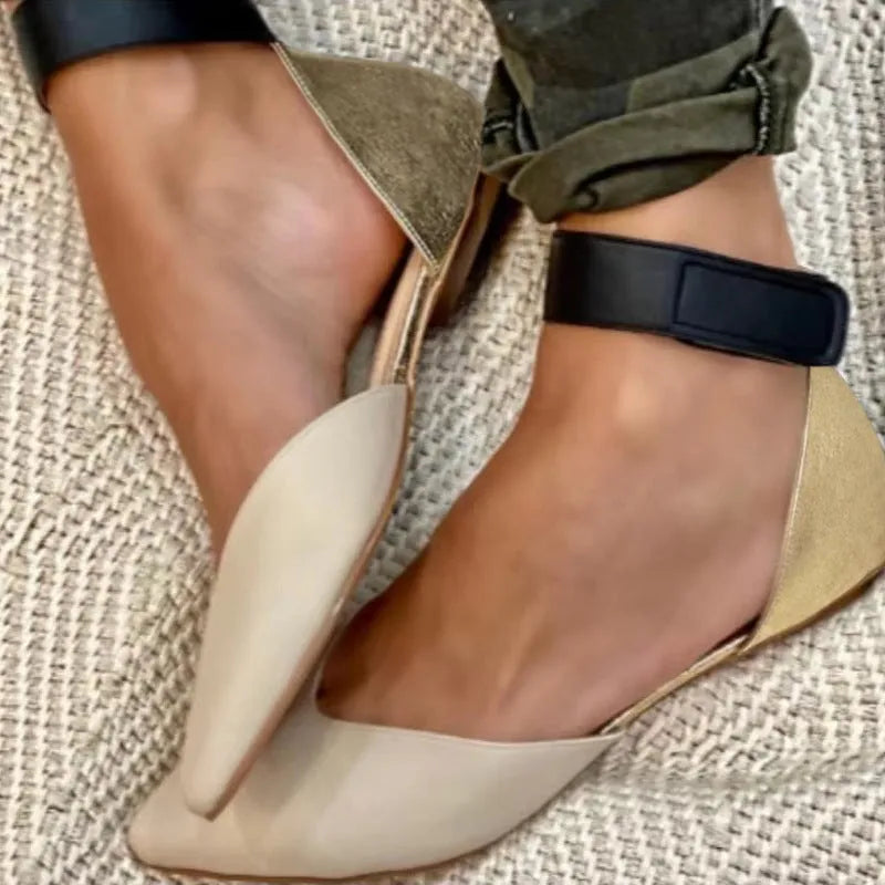 Women's velcro sandals with hollowed straps in four colour options showing flat heel design