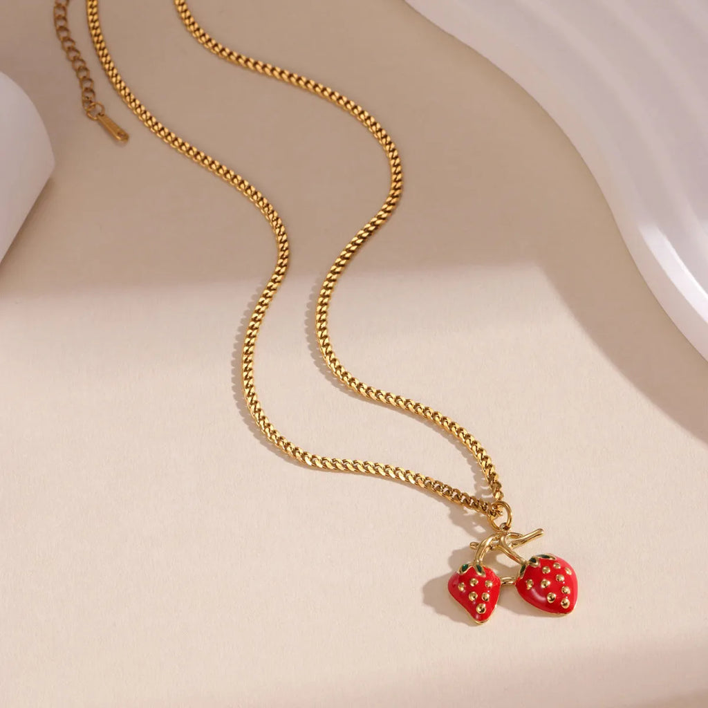 Strawberry fruit pendant necklace for women in stainless steel alloy with red or white gradient colour options