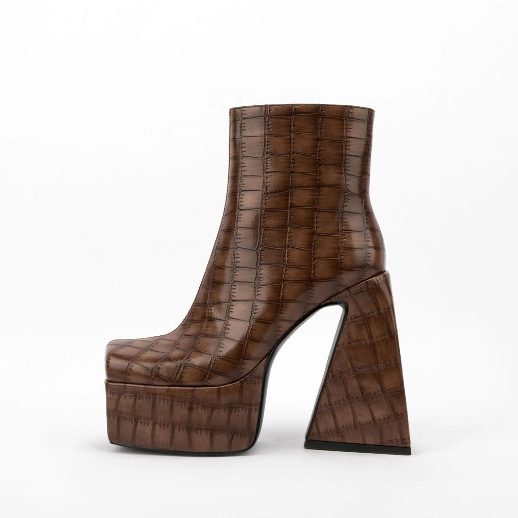 Women's ankle boots with a high heel in artificial PU leather, shown in a choice of colours.
