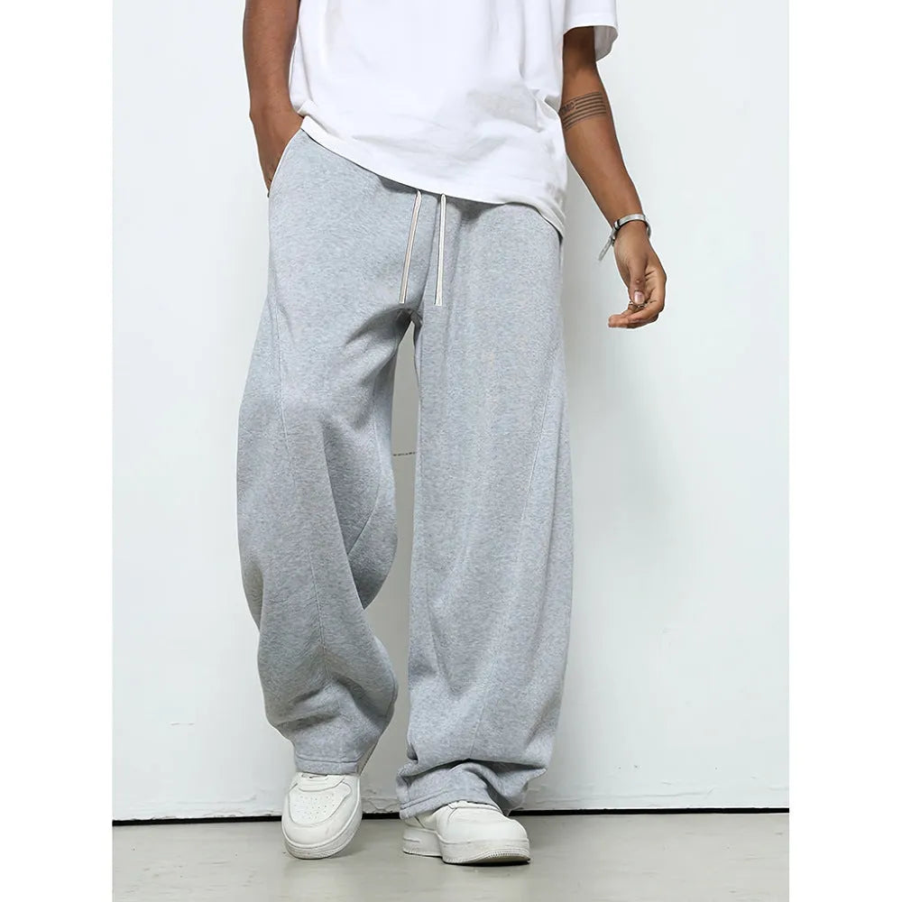 Men's straight leg casual trousers in black, dark grey and light grey colours with a drawstring waist.