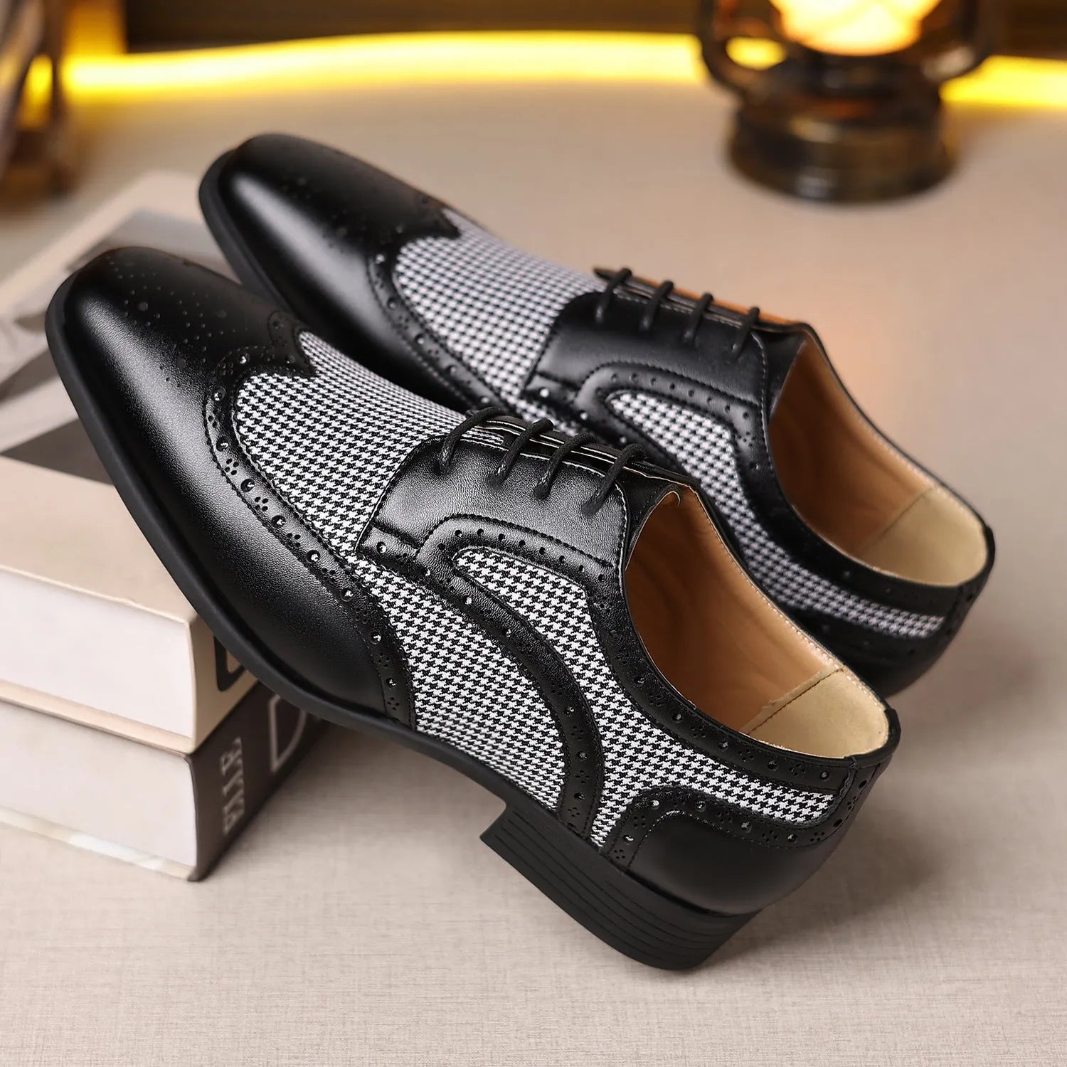 Man's imitation houndstooth plaid casual shoe in black with square toe and lace-up front.