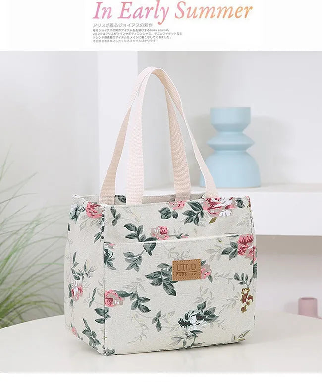 Women's printed canvas handbag with aluminium hardware showing floral design options