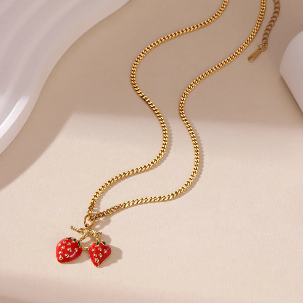 Strawberry fruit pendant necklace for women in stainless steel alloy with red or white gradient colour options