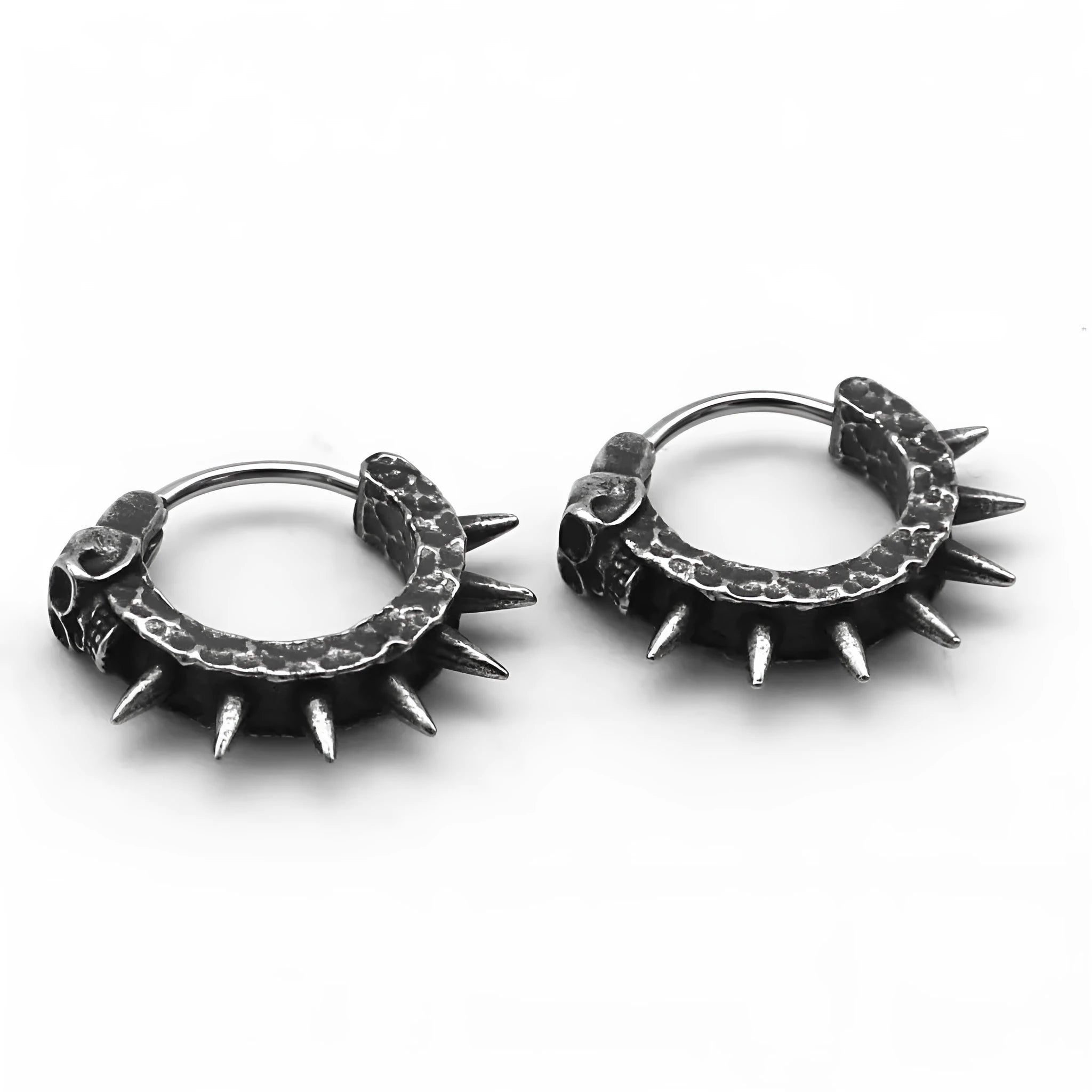 A pair of copper-coloured geometric punk motorcycle earrings with a black retro design on a hook fastening.