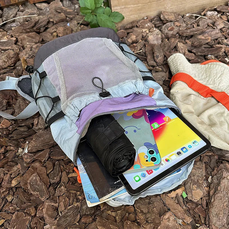 Japanese style casual backpack in waterproof nylon with a curved shoulder strap, shown in a solid colour.