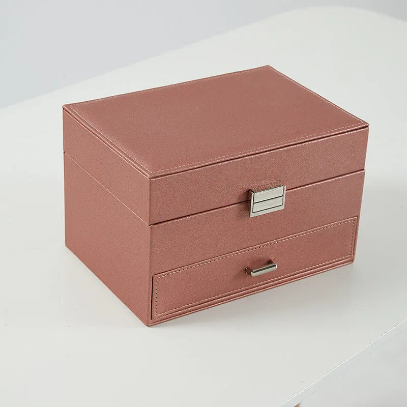 Hard leather jewellery storage box in beige, black, pink, or rose gold colour.