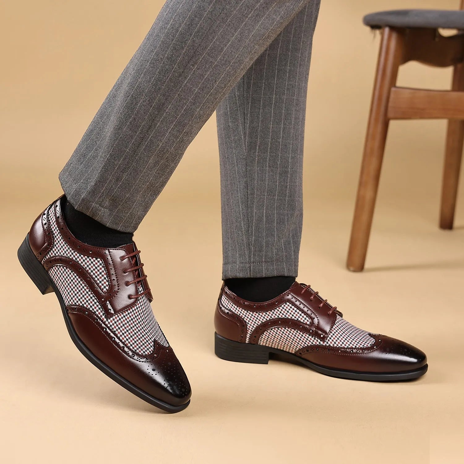 Man's imitation houndstooth plaid casual shoe in black with square toe and lace-up front.