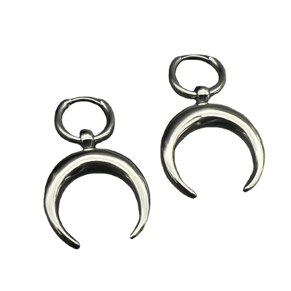 A pair of large silver geometric hoop earrings with a detailed Gothic moon motif, shown as clip-ons.