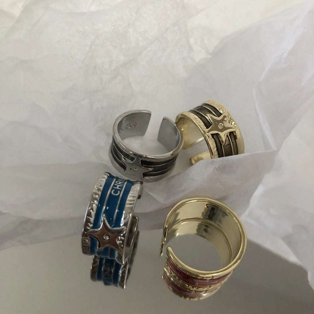Adjustable geometric copper ring with a distressed electroplated finish in a choice of colours.