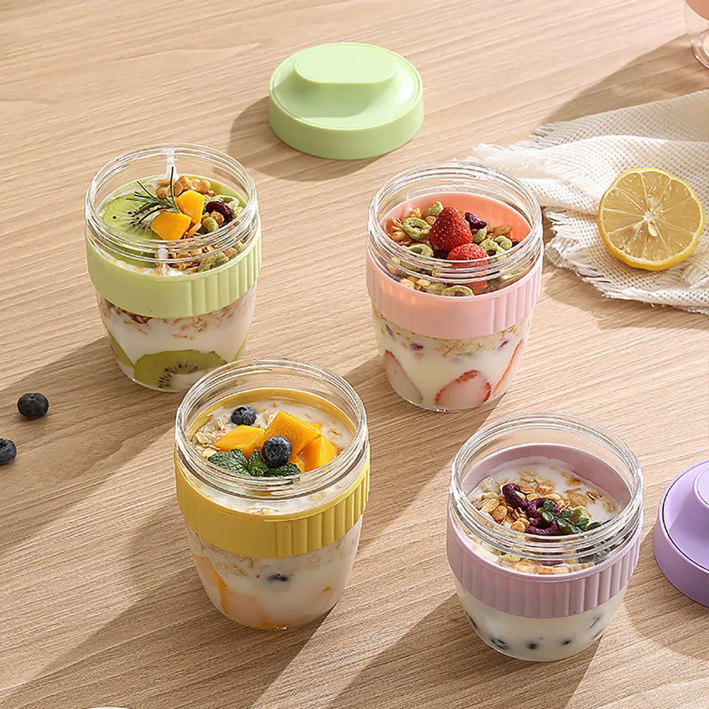Green microwave-safe plastic salad cup with white resealable lid and integrated spoon, shown with capacity options.