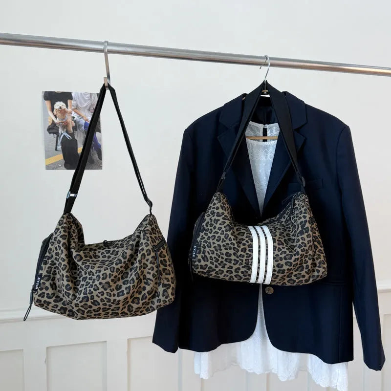 Leopard print sports style shoulder messenger bag with striped lining and stitching details