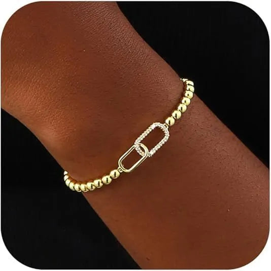 Adjustable stainless steel beaded bracelet with round beads in a simple geometric design.
