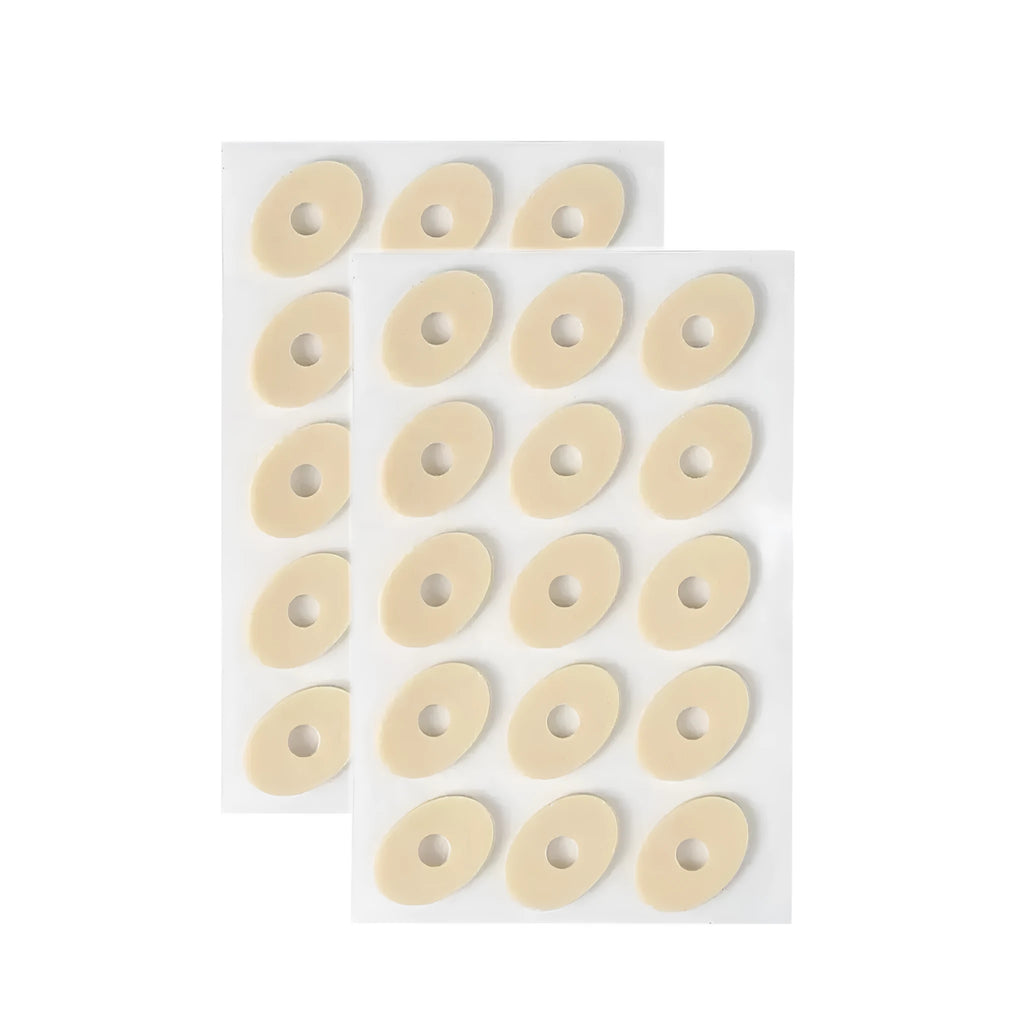 Women's PU heel corn protectors showing four different shapes: circular, large oval, small oval, and U-shaped pads