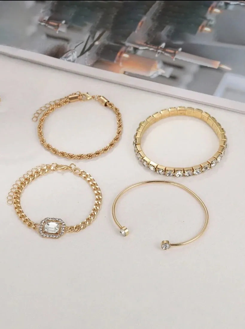 Four geometric retro-style alloy bracelets with square diamond design in gold and silver colours
