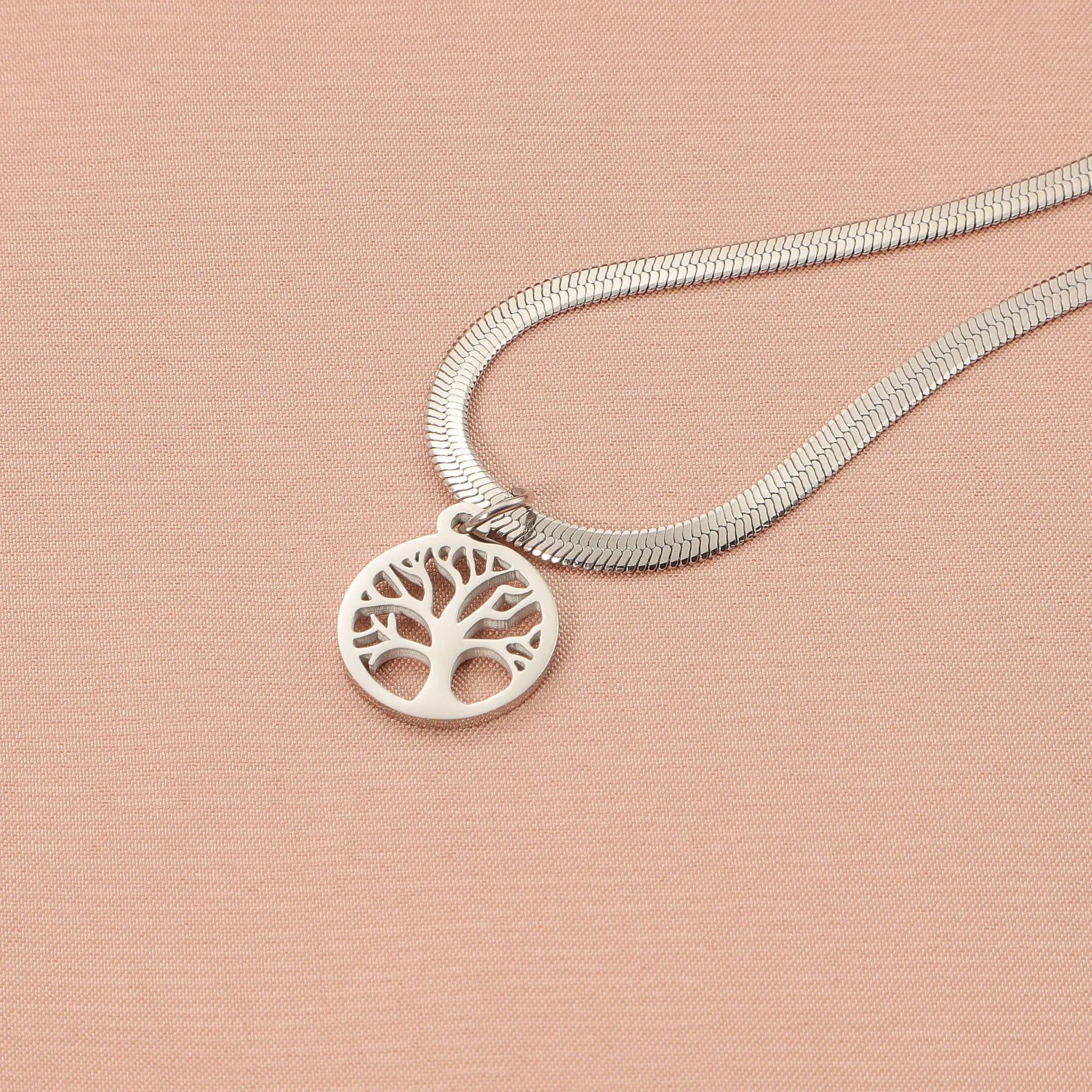 Stainless steel necklace with a U-shaped titanium steel tree pendant on a snake bones chain.