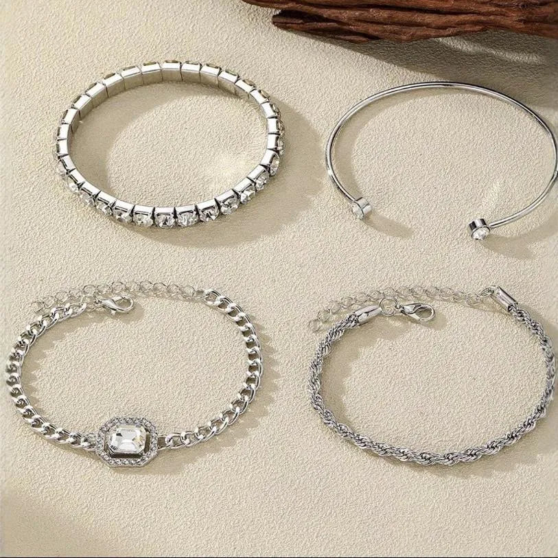 Four geometric retro-style alloy bracelets with square diamond design in gold and silver colours