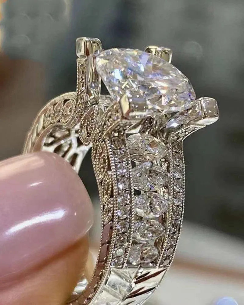Women's silver geometric engagement ring with electroplated gold or white finish and round design