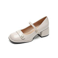 Women's patent leather chunky heel pump in apricot with square toe and buckle closure
